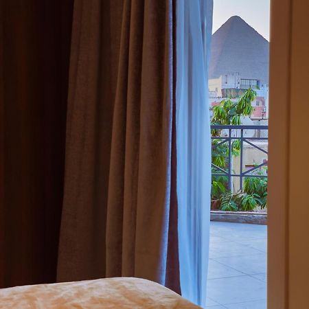 King Khufu Pyramids View Hotel Kafret el-Gabal Habitación foto