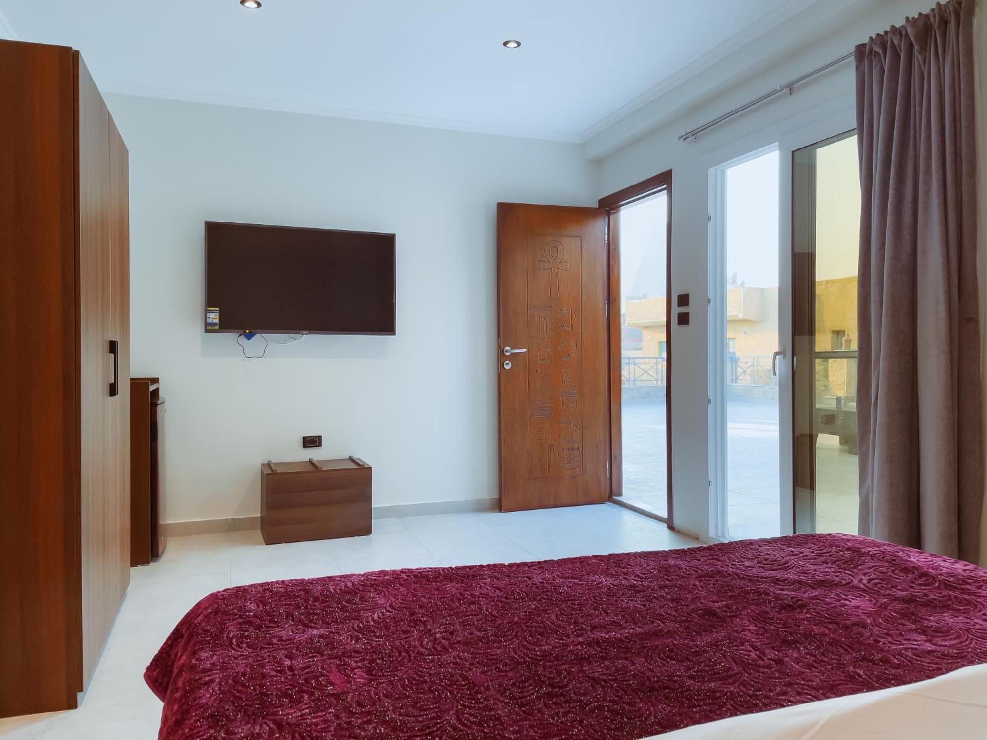 King Khufu Pyramids View Hotel Kafret el-Gabal Habitación foto