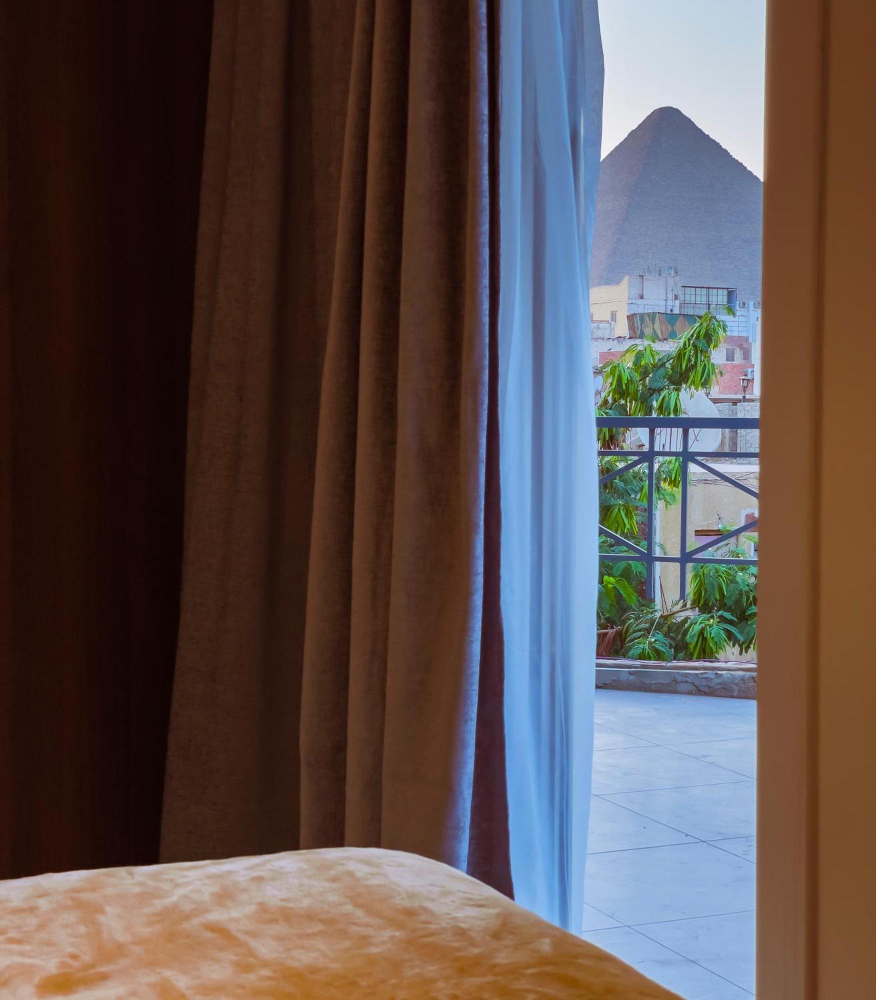King Khufu Pyramids View Hotel Kafret el-Gabal Habitación foto