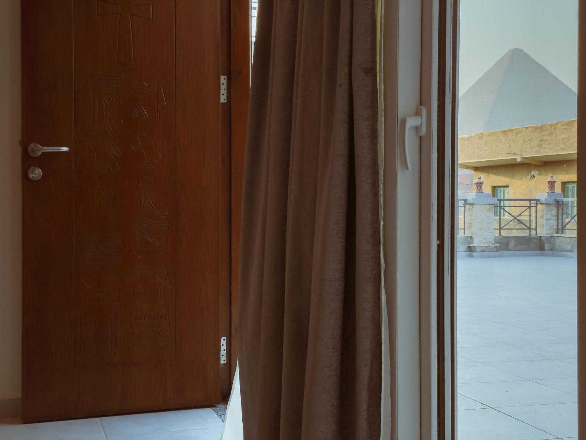 King Khufu Pyramids View Hotel Kafret el-Gabal Habitación foto