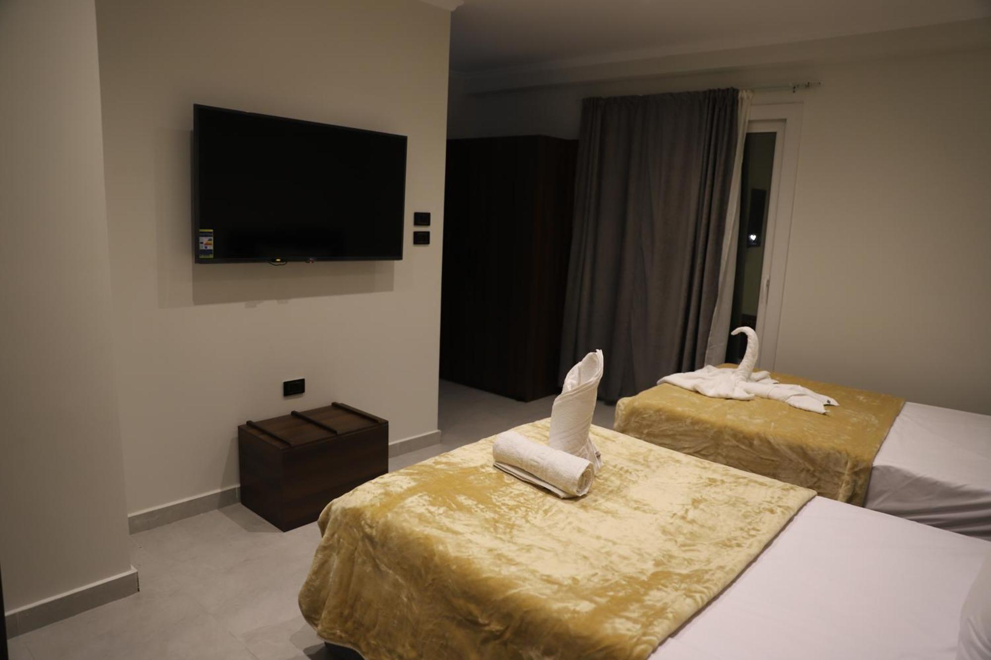 King Khufu Pyramids View Hotel Kafret el-Gabal Habitación foto