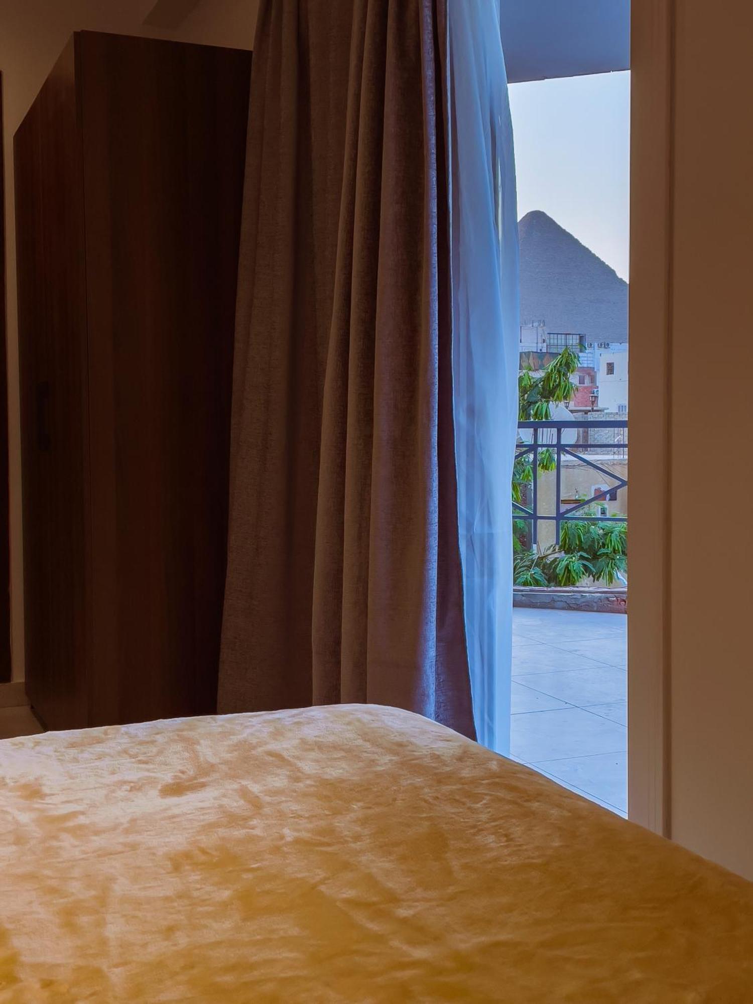 King Khufu Pyramids View Hotel Kafret el-Gabal Habitación foto