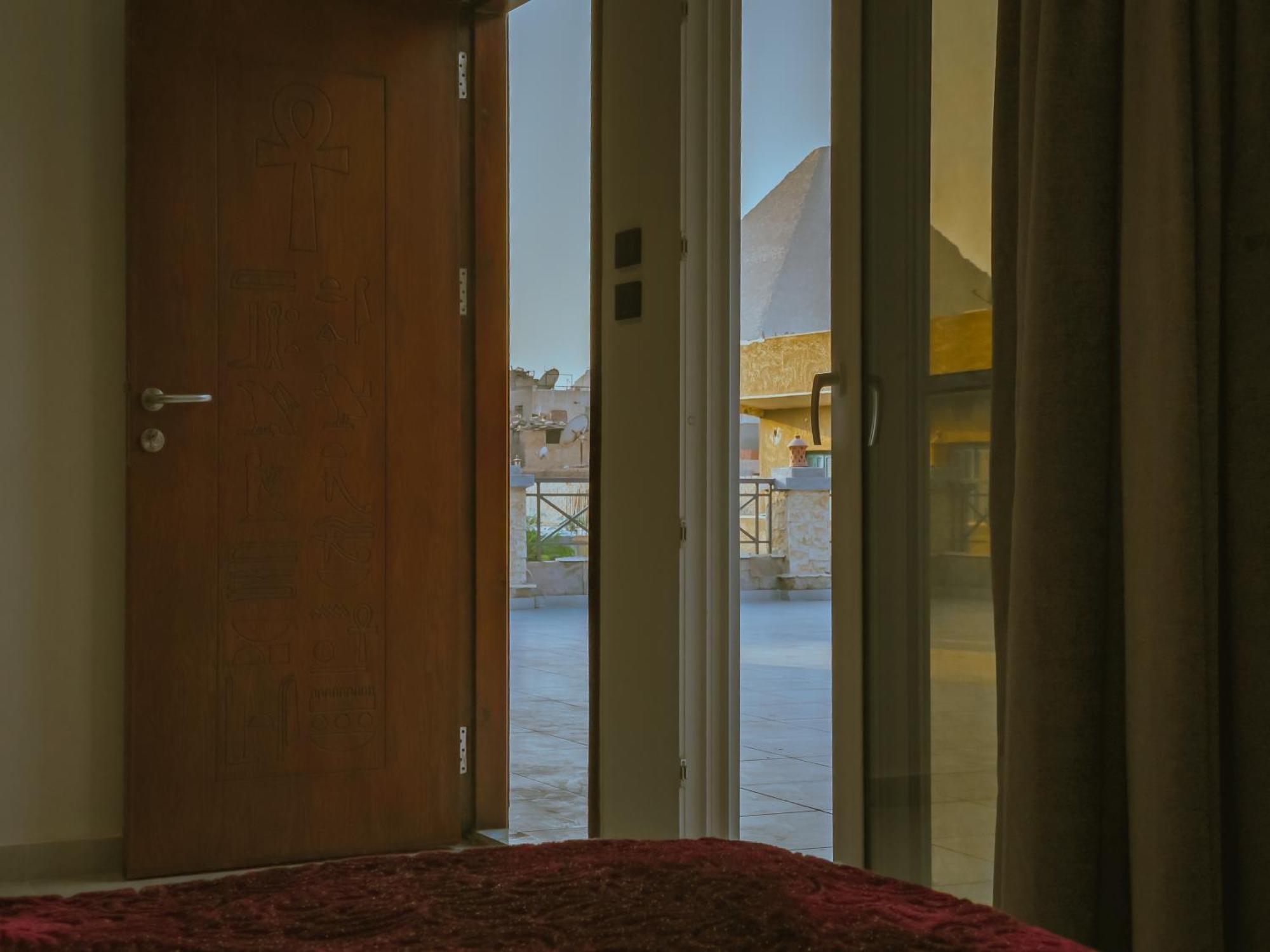 King Khufu Pyramids View Hotel Kafret el-Gabal Habitación foto